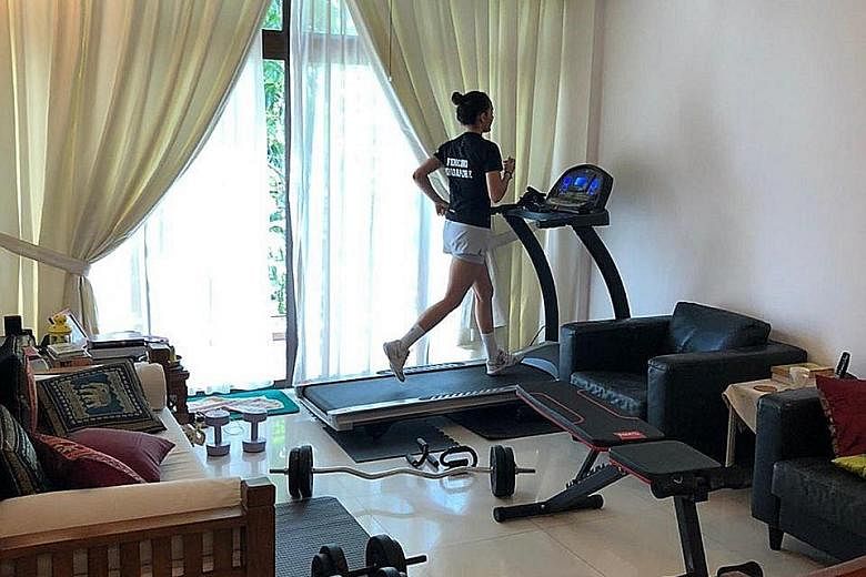 Amita Berthier using the treadmill to keep her fitness level up while serving a stay-home notice since Wednesday. PHOTO COURTESY OF AMITA BERTHIER