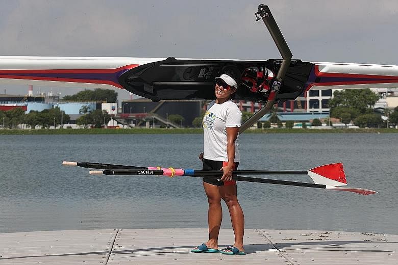 Qualifying for the Olympics consumes Joan Poh. It has led her to empty her savings, buy her own boat for $18,000, travel to multiple nations and hunt for coaches. ST PHOTO: TIMOTHY DAVID