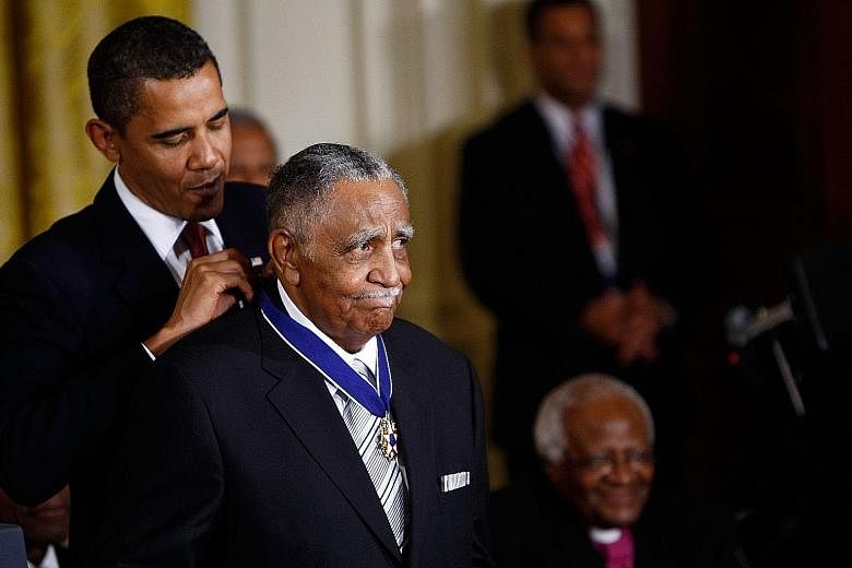 Then President Barack Obama presenting the Medal of Freedom to Reverend Joseph Lowery at the White House in 2009. PHOTO: AGENCE FRANCE-PRESSE
