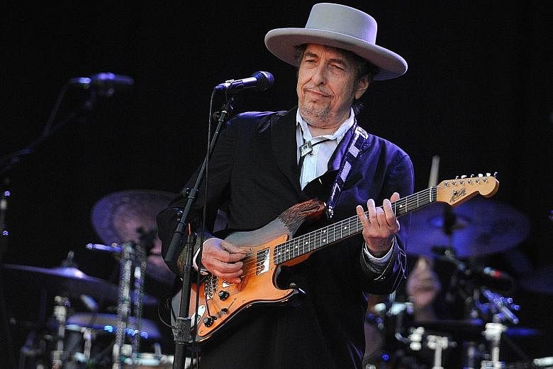 A file picture of Bob Dylan performing at a music festival in France in 2012. Last Friday, he released Murder Most Foul, a 17-minute ballad about the assassination of former United States president John F. Kennedy in 1963.