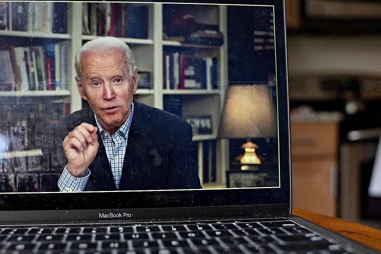 Democratic presidential candidate Joe Biden speaking during a virtual press briefing last Wednesday. Desperate to stay relevant, Mr Biden and his rival Bernie Sanders are participating in multiple webcasts, including roundtables with their respective