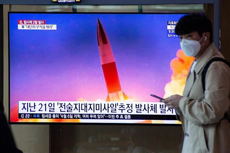 A news broadcast on North Korea's latest projectile launch seen at a Seoul train station yesterday. North Korea fired what appeared to be two short-range ballistic missiles from the coastal Wonsan area, according to South Korea, which called for an i
