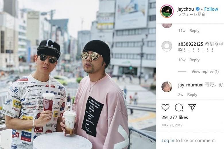Singers JJ Lin (left) and Jay Chou, seen here in Japan last year, are close friends off-screen. 
