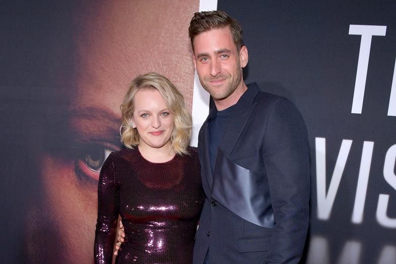 The Invisible Man's co-stars Elisabeth Moss and Oliver Jackson-Cohen (both left) at the film's premiere in Hollywood last month.