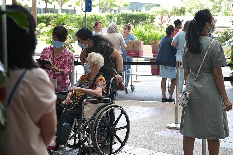 PROTECTING THE ELDERLY: Singaporeans who are unwell have been urged to avoid visiting seniors, as the elderly have shown a higher risk of developing serious conditions when infected. ST PHOTO: KELVIN CHNG SEE TOP OF THE NEWS A4