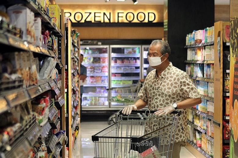Malaysian Prime Minister Muhyiddin Yassin shopping at a Kuala Lumpur supermarket. He later posted on Facebook that he was thankful to find it well stocked and that people were mindful about social distancing. It was evident that he was sending a mess