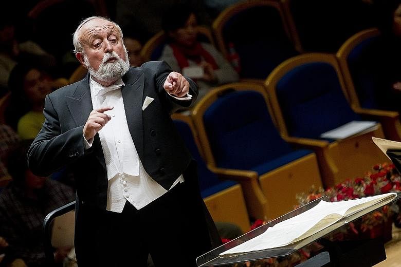 Polish composer Krzysztof Penderecki conducting China's National Symphonic Orchestra in Beijing in 2011.
