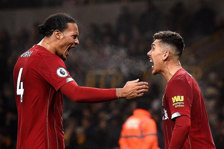 Defender Virgil van Dijk (left) and forward Roberto Firmino are key players of runaway Premier League leaders Liverpool. The Reds were well on course for their first English top-flight title since 1990 when the league was suspended owing to the coron