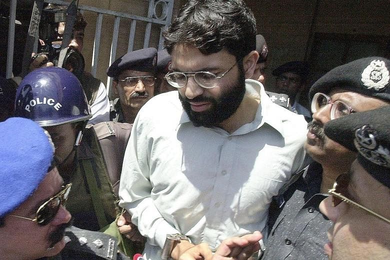 Mr Daniel Pearl was investigating Islamist militants in Karachi after the Sept 11, 2001, attacks when he was kidnapped in January 2002. Video emerged a few weeks later of his murder. A file photo of Ahmed Omar Saeed Sheikh leaving a court in Karachi 