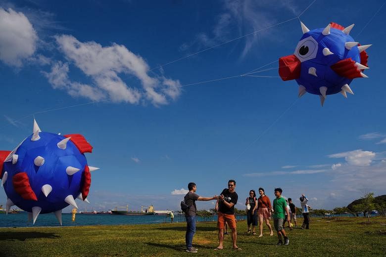 Giant kites designed to look like pufferfish at Marina Barrage on March 15. Most of South-east Asia, including Singapore, experienced dry and warm conditions last month. Singapore recorded daily maximum temperatures that exceeded 34 deg C for 27 days