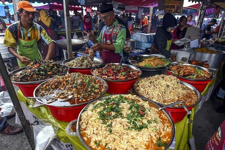 Malaysia's annual Ramadan bazaars feature stalls selling freshly cooked food and beverages, among other things, for Muslims to break their fast. The Muslim fasting month this year starts on April 23, nine days after the last day of Malaysia's movemen