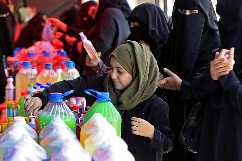 People in Yemen shopping for hand and surface disinfectants at a market in Sanaa this week. Yemen has not confirmed any coronavirus cases but is seen as especially vulnerable because of a five-year conflict that has brought its health system to the b