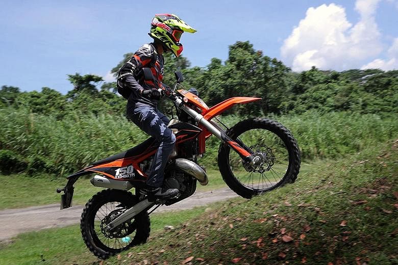 Light and nimble, the KTM 150EXC TPI is easy to ride over slopes and tight trails.