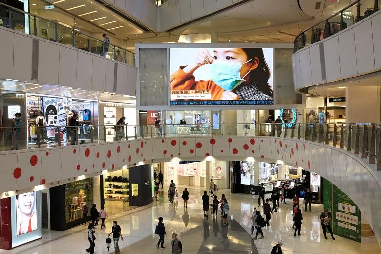 Health advice being broadcast on a big TV screen at a mall in Hong Kong earlier this week. One issue that came up during yesterday's Facebook Watch news event on the spread of the coronavirus in the Asia-Pacific is how the virus can linger in the air