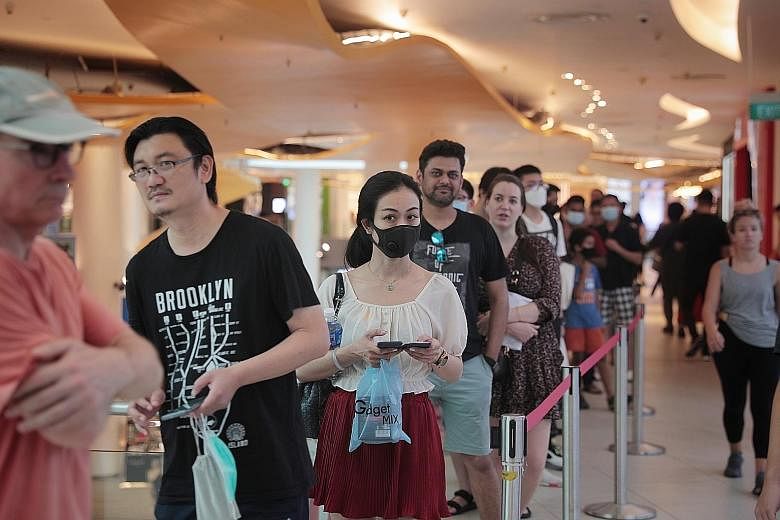 A bustling crowd did not seem to be observing safe distancing rules at Geylang Serai Market yesterday, and the same was true at other wet markets around Singapore as people shopped for fresh cuts of meat and seafood.