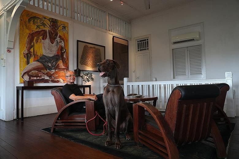 Chen's 1986 solo exhibition in Paris was inaugurated by the late David Marshall, Singapore's then ambassador to France. Artist Henri Chen KeZhan, 61, with his dog Anton, an adopted great dane. Chen's parents initially objected to his pursuing art, bu