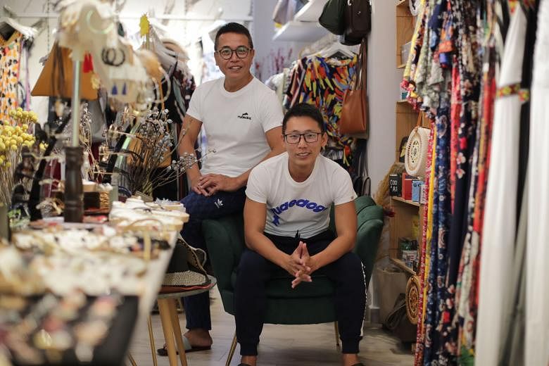 Mr Zachery Masot (far left) and Mr Darryl Yan, founders of a group of touristdependent stores in Haji Lane, say their staff contributed greatly to the company during good times, so during this coronavirus crisis, it is important for the company to take ca