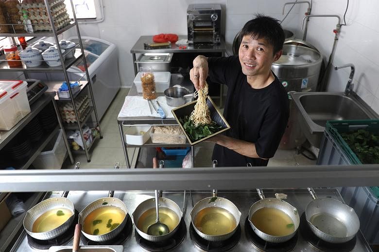 Mr Alan Ng, owner of China Whampoa Home Made Noodles, at its new outlet at Geylang Lorong 12. While business is still thriving, plans for further expansion have been put on hold for now. 
