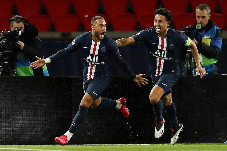 Paris St-Germain striker Neymar celebrating with Marquinhos after scoring the first goal against Dortmund in their Champions League round-of-16 second leg last month. The French side won 3-2 on aggregate but the European tournament has been suspended