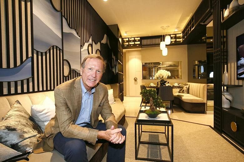 SingHaiyi's group managing director Celine Tang and non-executive chairman Neil Bush, brother of former US president George W. Bush. Amid the coronavirus crisis, the group has seen the value of its holdings in four real estate investment trusts fall 
