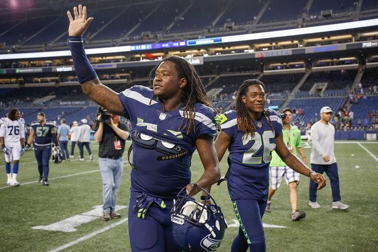 Above: The Seattle Seahawks' twins, linebacker Shaquem Griffin (left) and cornerback Shaquill Griffin. 