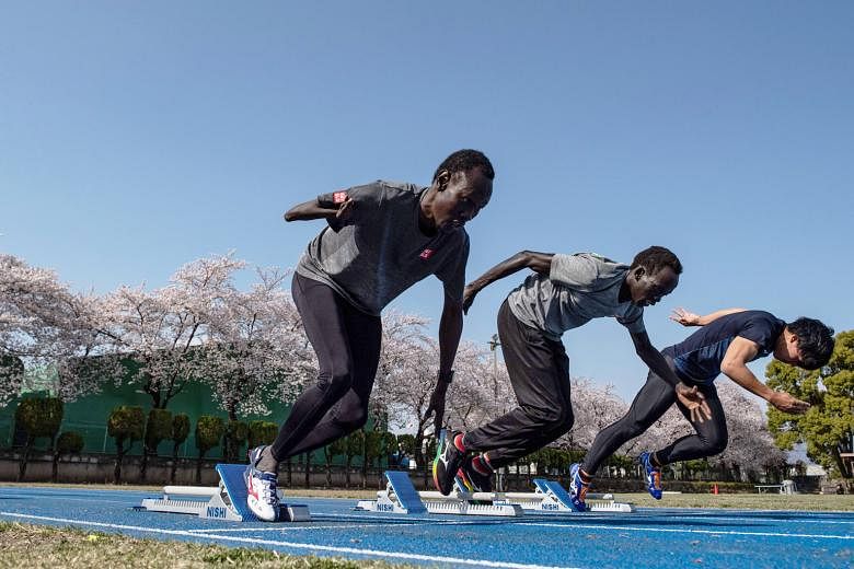 South Sudan para athlete Michael Machiek Ting Kutjang (far left) training in Maebashi, north of Tokyo, for the 2020 Paralympics, which have been postponed to next year. He is among a small team hosted by the city since November as part of its efforts