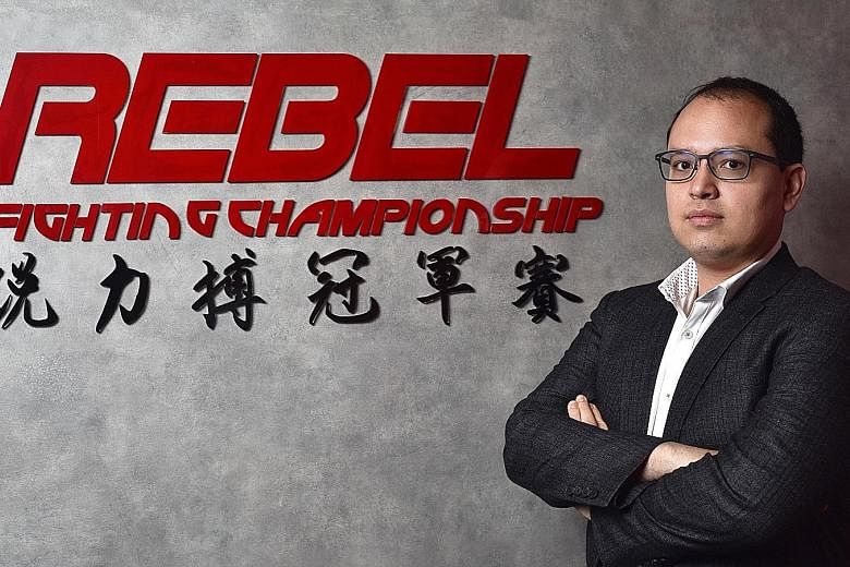 Above: Rebel FC chief executive officer Justin Leong is open to staging a show in Singapore next year. Left: Wang Shuo from China (in black shorts) taking on Aydin Kodekov from Kazakhstan at the Rebel FC 10: The New Order event held in Moscow in Janu