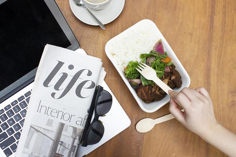 A $10 takeaway meal from Grand Hyatt called “Meal in a Box, Wellness on the Go” with slow-braised Australian grass-fed beef rendang and steamed organic rice.