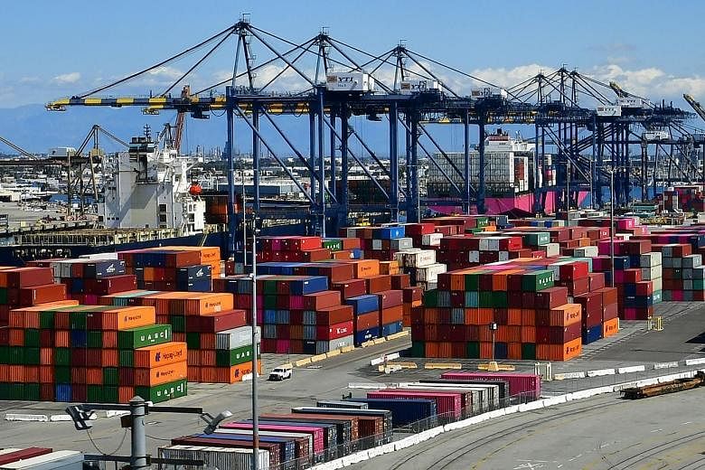 Containers at the Port of Los Angeles last month. The port saw a 31 per cent drop in volume last month, compared with a year ago, as retailers scaled back orders. PHOTO: AGENCE FRANCE-PRESSE