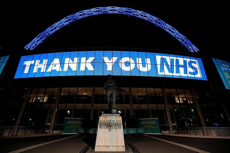 Wembley Stadium in London could be one of the host venues for games when the Premier League resumes after the coronavirus pandemic. PHOTO: REUTERS