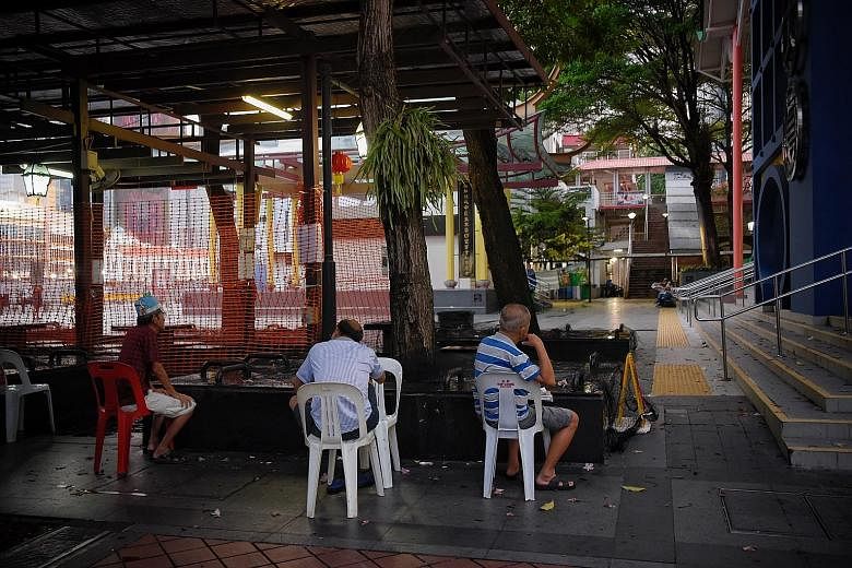 A small group of elderly men outside Chinatown Complex Food Centre yesterday evening despite the circuit breaker measures in place. The continued relentless rise in unlinked cases is reason for the strict measures to break the circuit of transmission