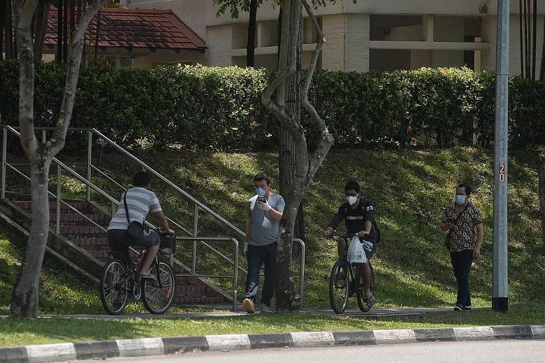 Wearing a mask in public is now mandatory for all in Singapore, except people doing strenuous exercise and children below the age of two. The authorities will exercise flexibility for children with special needs. ST PHOTO: KUA CHEE SIONG