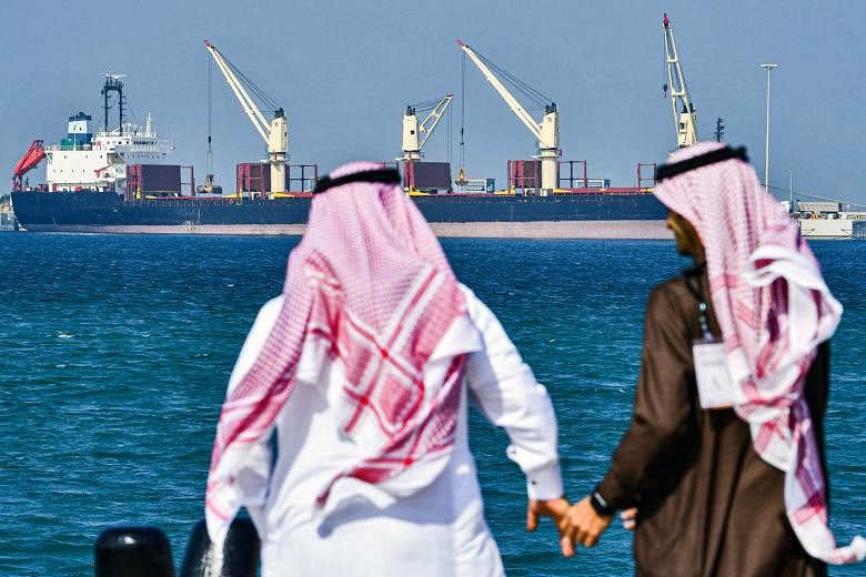 An oil tanker at the port of Ras al-Khair, Saudi Arabia, last year. Saudi Arabia, Russia and other Opec+ exporters have said they will cut output by just under 10 million barrels a day over the next two months. PHOTO: AGENCE FRANCE-PRESSE