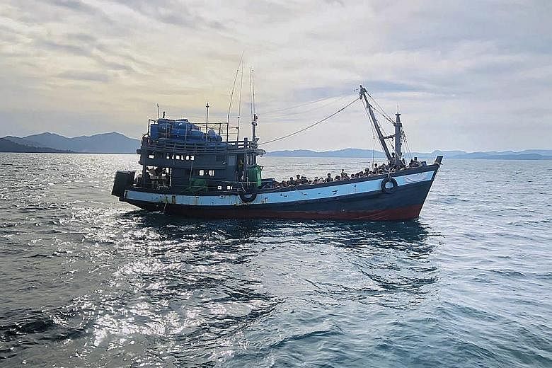 An April 5 photo from the Malaysian Maritime Enforcement Agency showing a boat carrying suspected Rohingya migrants detained in Malaysian territorial waters off the island of Langkawi. Malaysia is a favoured destination for the migrants from Myanmar,