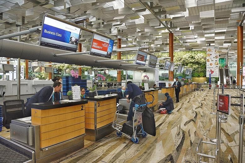 A check-in counter at Changi Airport Terminal 3. Aviation and tourism businesses that qualify for the Jobs Support Scheme include airlines, airport ground handlers, travel agents and hotels.