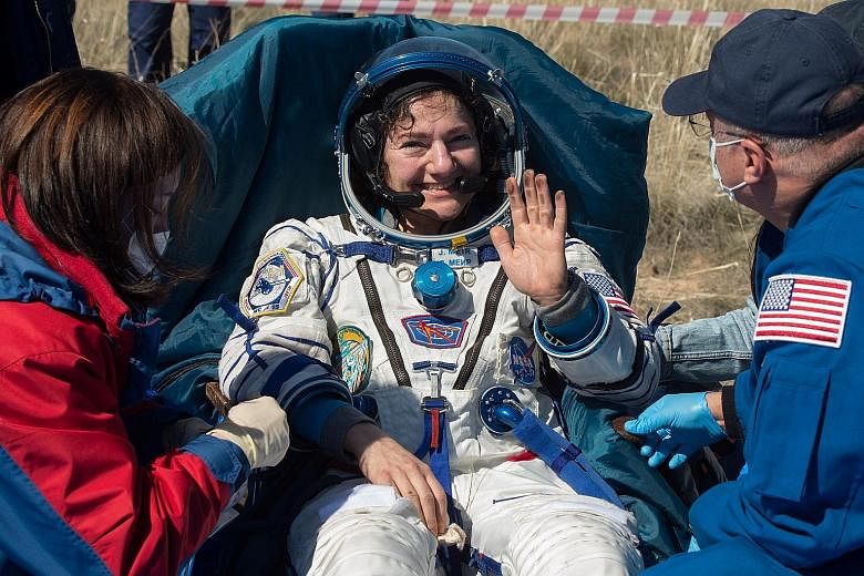 American Jessica Meir and Russian Oleg Skripochka are the other ISS crew members who returned to find a world changed by the coronavirus pandemic.