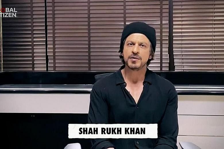 Other stars in the line-up included Pearl Jam frontman Eddie Vedder, American pop star Lizzo and Bollywood star Shah Rukh Khan (above).