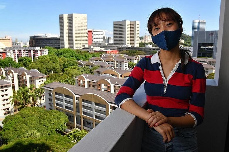 Redhill resident Ethel Pang, 22, is a Wimby, or Welcome In My Backyard, ambassador. She has already engaged family members about workers in the estate and hopes to reach more via the grassroots network. ST PHOTO: CHONG JUN LIANG