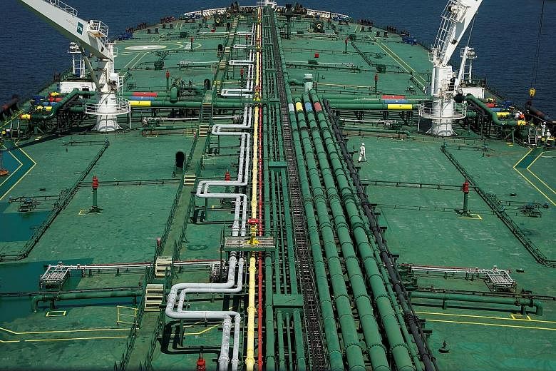 Pipelines running along the deck of Singapore oil trader Hin Leong's Pu Tuo San VLCC (very large crude carrier), when the supertanker was in the waters off Jurong Island last year. The company, founded in 1963, owes some US$3.85 billion (S$5.5 billio