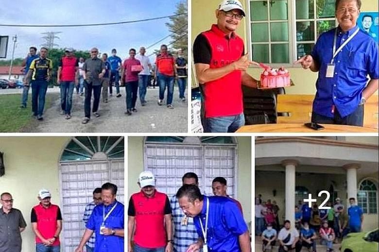 Malaysia's Deputy Rural Development Minister Abdul Rahman Mohamad (in blue shirt) says a gathering where a cake was presented to him by a group of people was unplanned and not meant to violate the country's movement control order. The photos sparked 
