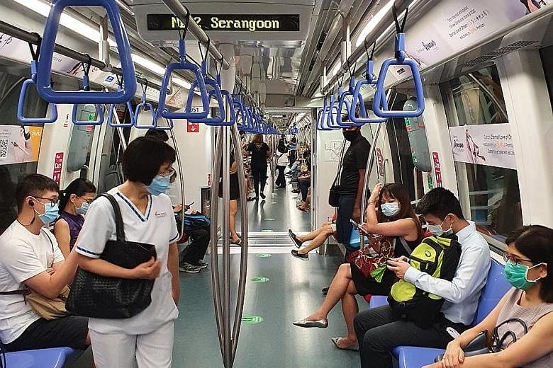 A North East Line (NEL) train at 8.25am yesterday. On NEL trains, commuters were able to practise safe distancing with relative ease and trains were observed arriving within two minutes on that line. The LTA said trains will now run every three minut