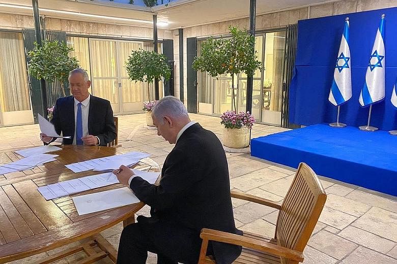 Israeli Prime Minister Benjamin Netanyahu (right) and Mr Benny Gantz at their meeting in Jerusalem on Monday.