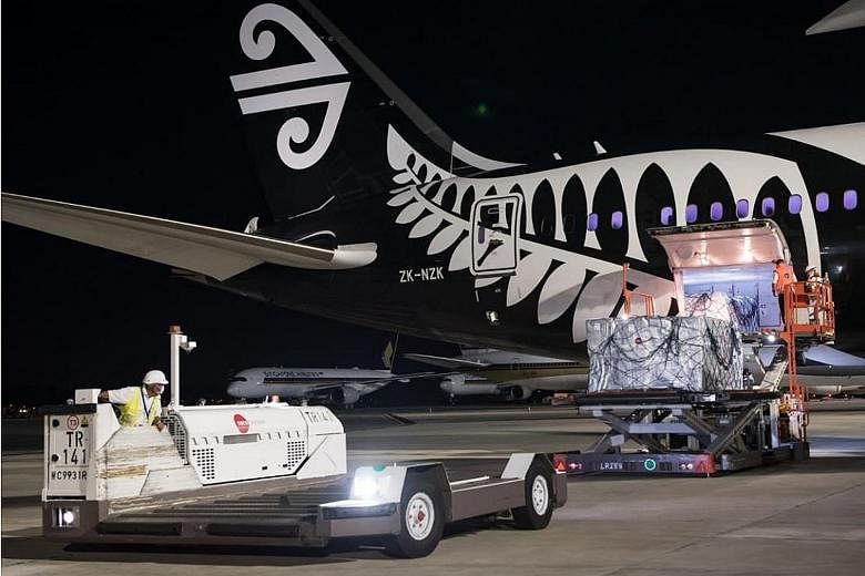 An Air New Zealand flight arrived at Changi Airport yesterday carrying about 20 tonnes of meat, including beef and lamb. This was the first shipment of essential items sent from New Zealand under a trade declaration launched last week between the cou