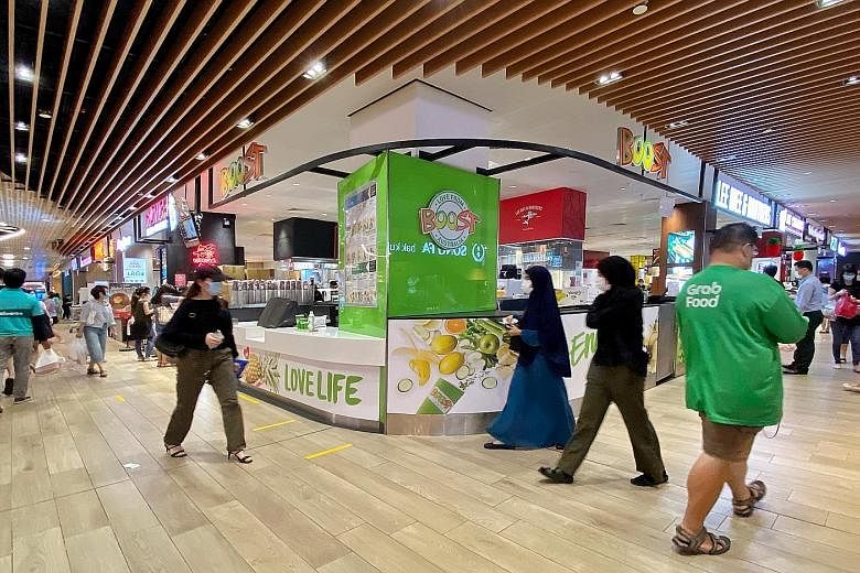 Jem shopping mall, where the Boost fruit juice outlet was closed yesterday. The list of services considered essential and allowed to open was trimmed to exclude some F&B outlets as well as barbers and other businesses, effective yesterday.