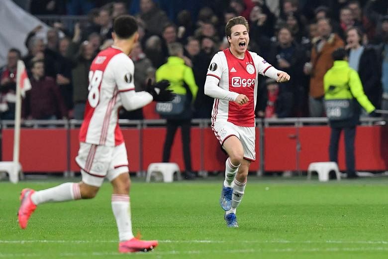 Carel Eiting of Ajax Amsterdam celebrating his goal in a Europa League match against Getafe at the Johan Cruyff Arena in February. The Dutch football federation is proposing the cancellation of the rest of the domestic season, with Ajax leading AZ Al