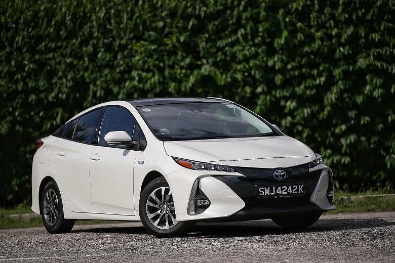 The Toyota Prius PHV has an electric range of about 50km and its lithium battery can be fully recharged in about three hours. 