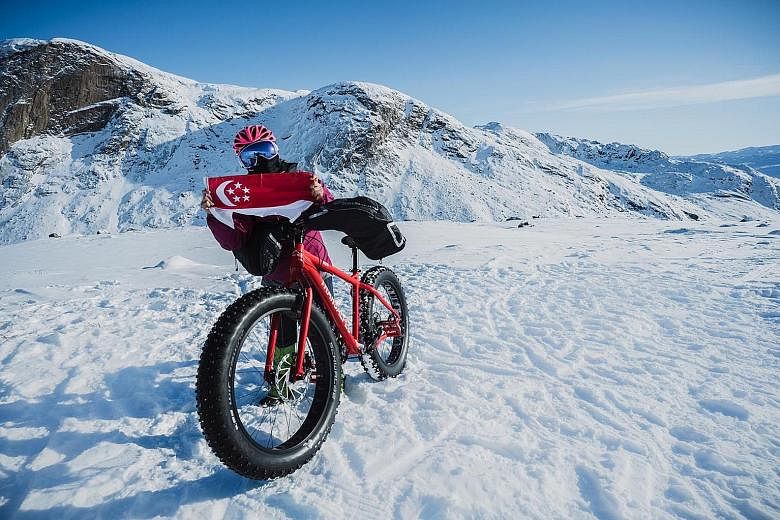 Ms Sandra Lim is the first Singaporean to bike across the Arctic Circle Trail of Greenland in winter.