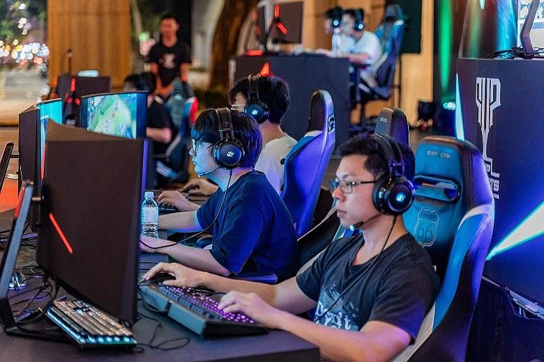 Singtel in 2018 created PVP Esports, a multi-game and multi-country e-gaming competition. More than 50,000 attended its community leagues' regional grand finals in Singapore last year. PHOTO COURTESY OF SINGTEL