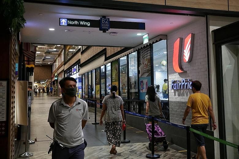 The FairPrice outlet at Northpoint City in Yishun remained open yesterday, as did most of the mall's eateries and shops selling food items. ST PHOTO: KEVIN LIM