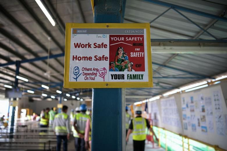 A sign reminding workers to pay attention to safety at Kim Chuan Depot. Minister of State for Manpower Zaqy Mohamad said employers and workers need to press on with efforts to improve workplace safety and health, in remarks shared on video for yester